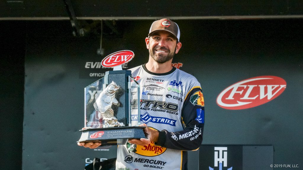 FLW-Tour-pro-Casey-Scanlon-holds-up-his-trophy-after-winning-the-FLW-Tour-on-Lake-Champlain-presented-by-T-H-Marine.-Kyle-Wood