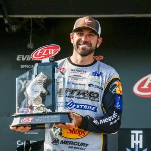 FLW-Tour-pro-Casey-Scanlon-holds-up-his-trophy-after-winning-the-FLW-Tour-on-Lake-Champlain-presented-by-T-H-Marine.-Kyle-Wood